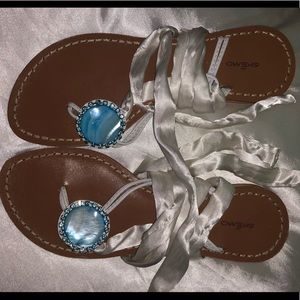 White satin tie up sandal with blue stone detail